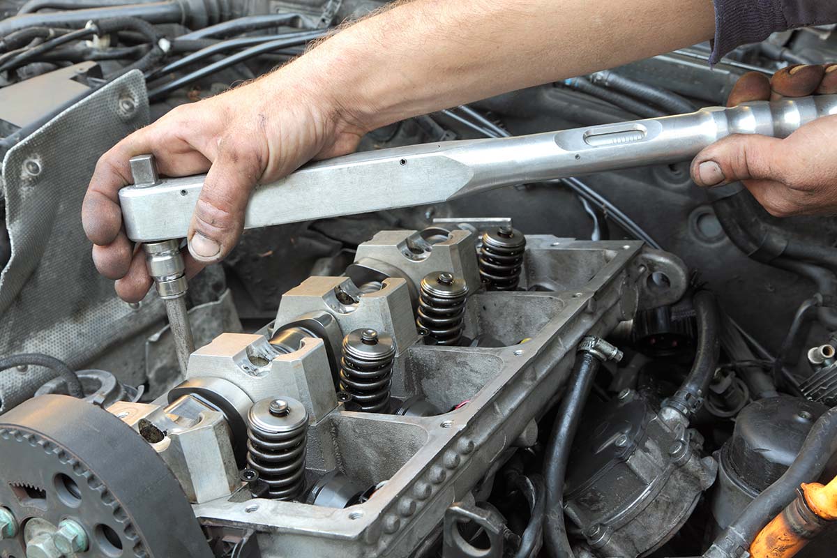 Mechanic working on vehicle